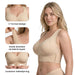 Beige Trueform-BH med lukking foran, brede stropper og detaljer ved utringningen.
