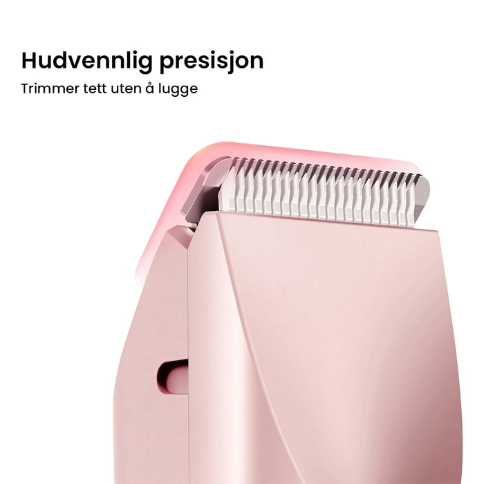 Nærbilde av et rosa skjærehode til Kroppstrimmer Ultra med metallblader.